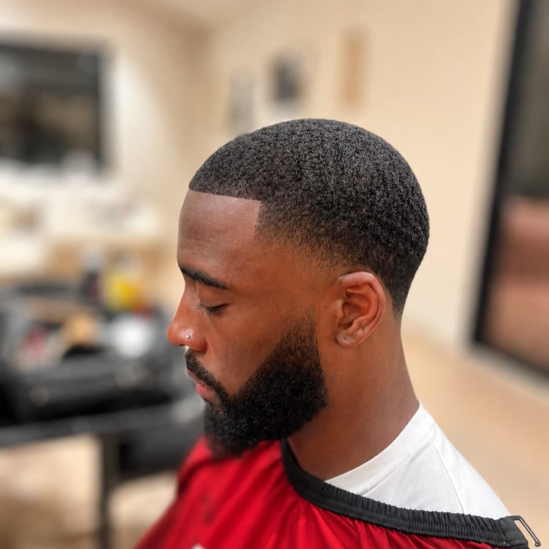 Fresh skin fade and sculpted beard by Richard